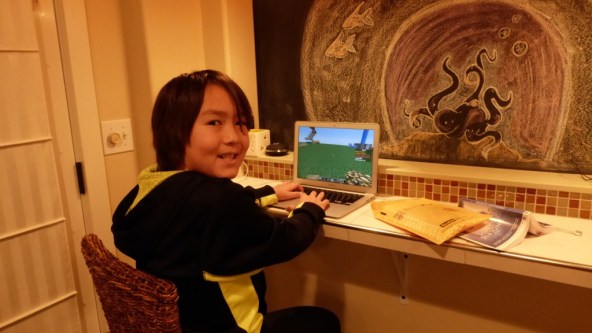 Isaac playing Minecraft