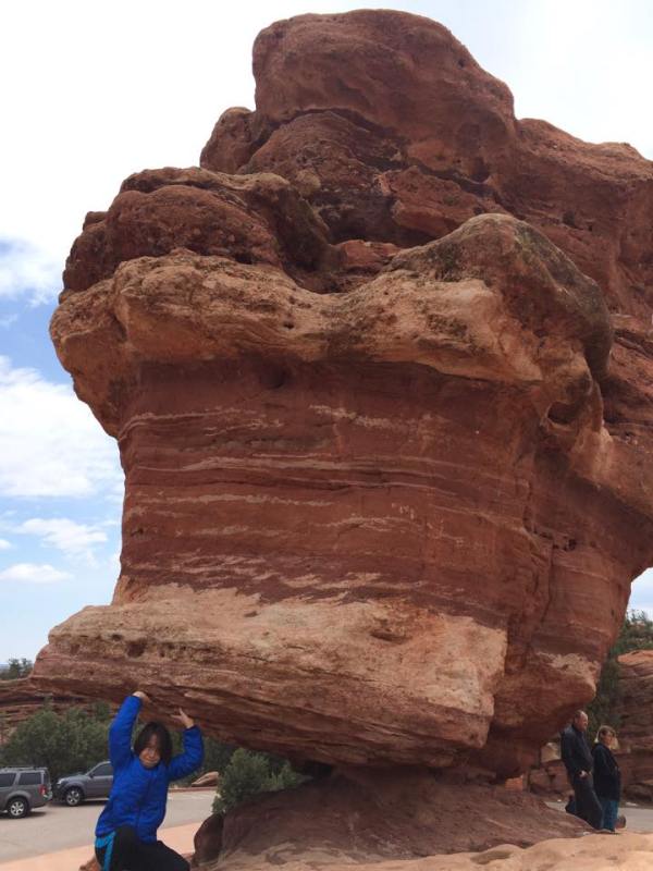 isaac holding up rock